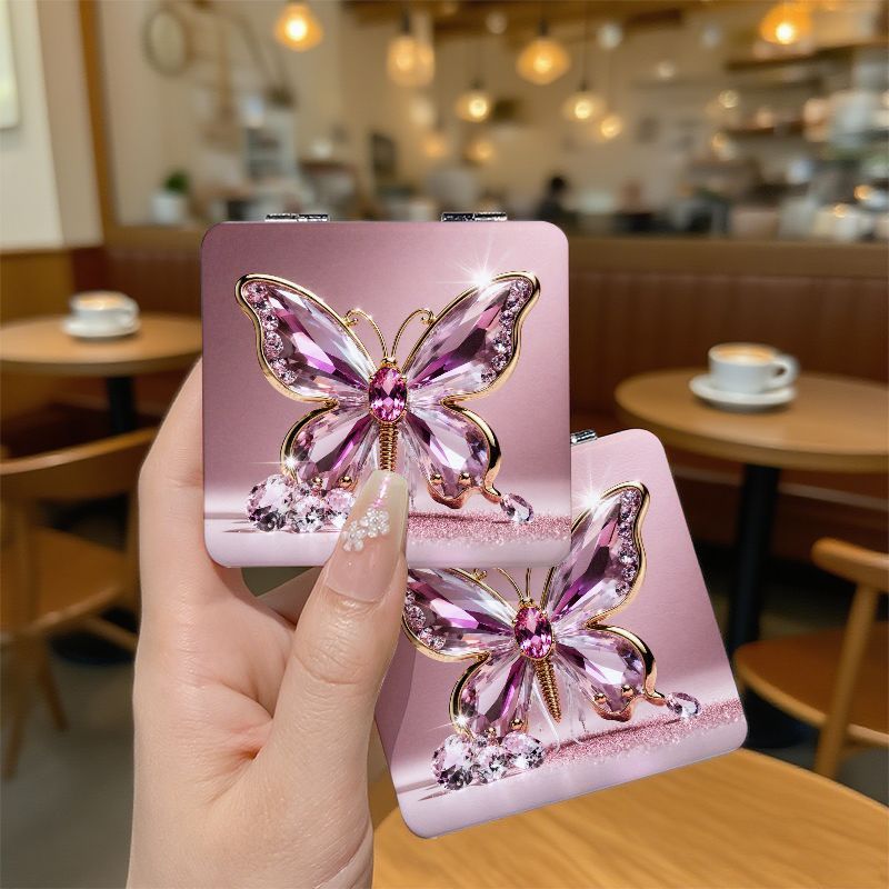 A Compact Square Mirror with a European And American Style, This Portable Mini Hand Mirror Is Perfect for Students. It Features a Cute Cartoon Design, Double-Sided Folding, And Magnification